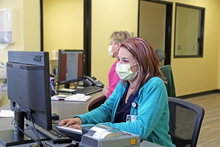 Nurses working at one of the infusion services centers, part of aspire health.